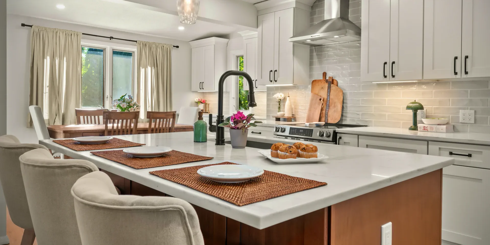 Bright Pittsfield kitchen with white cabinetry, a rift-sawn white oak island, and quartz countertops.